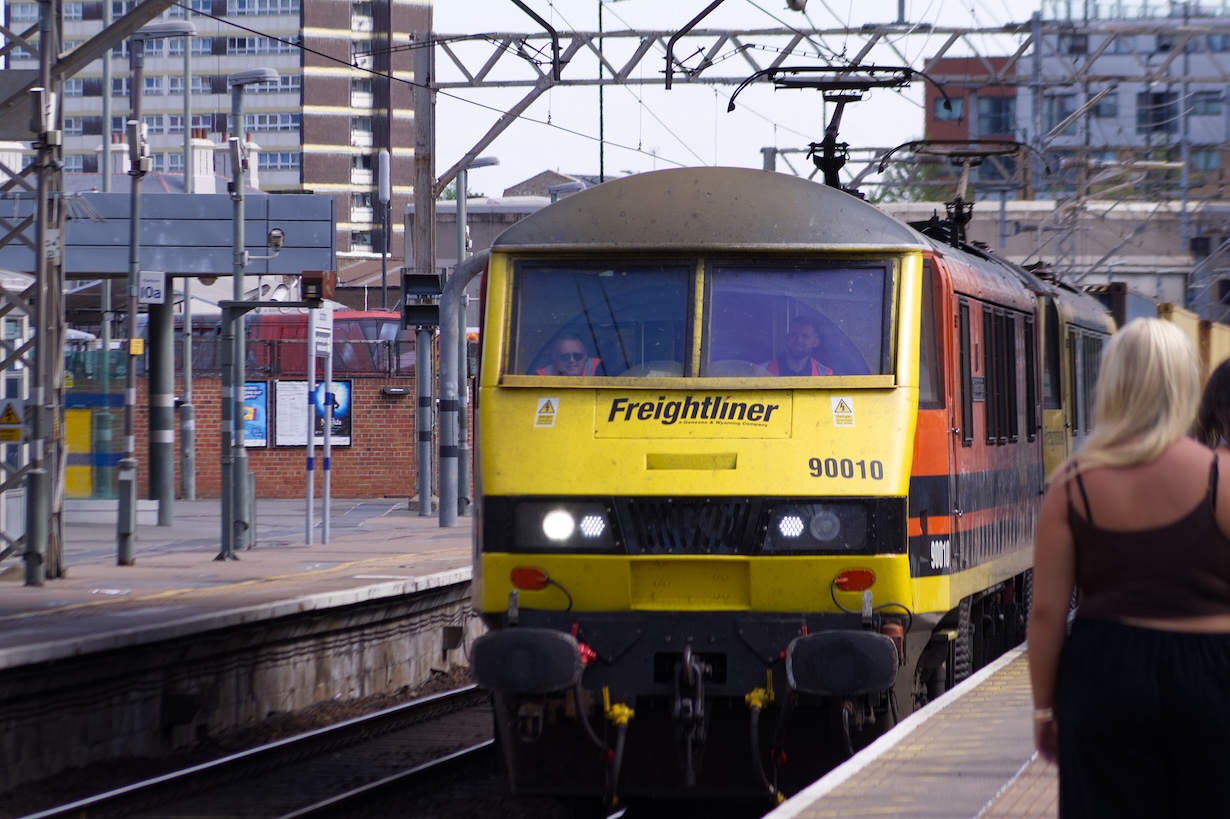 90010 + another class 90 hauling freight through Stratford