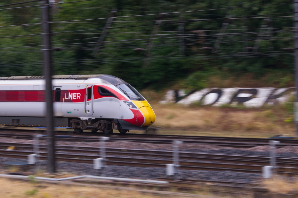 LNER Azuma 801222, taken at speed passing the brick York sign